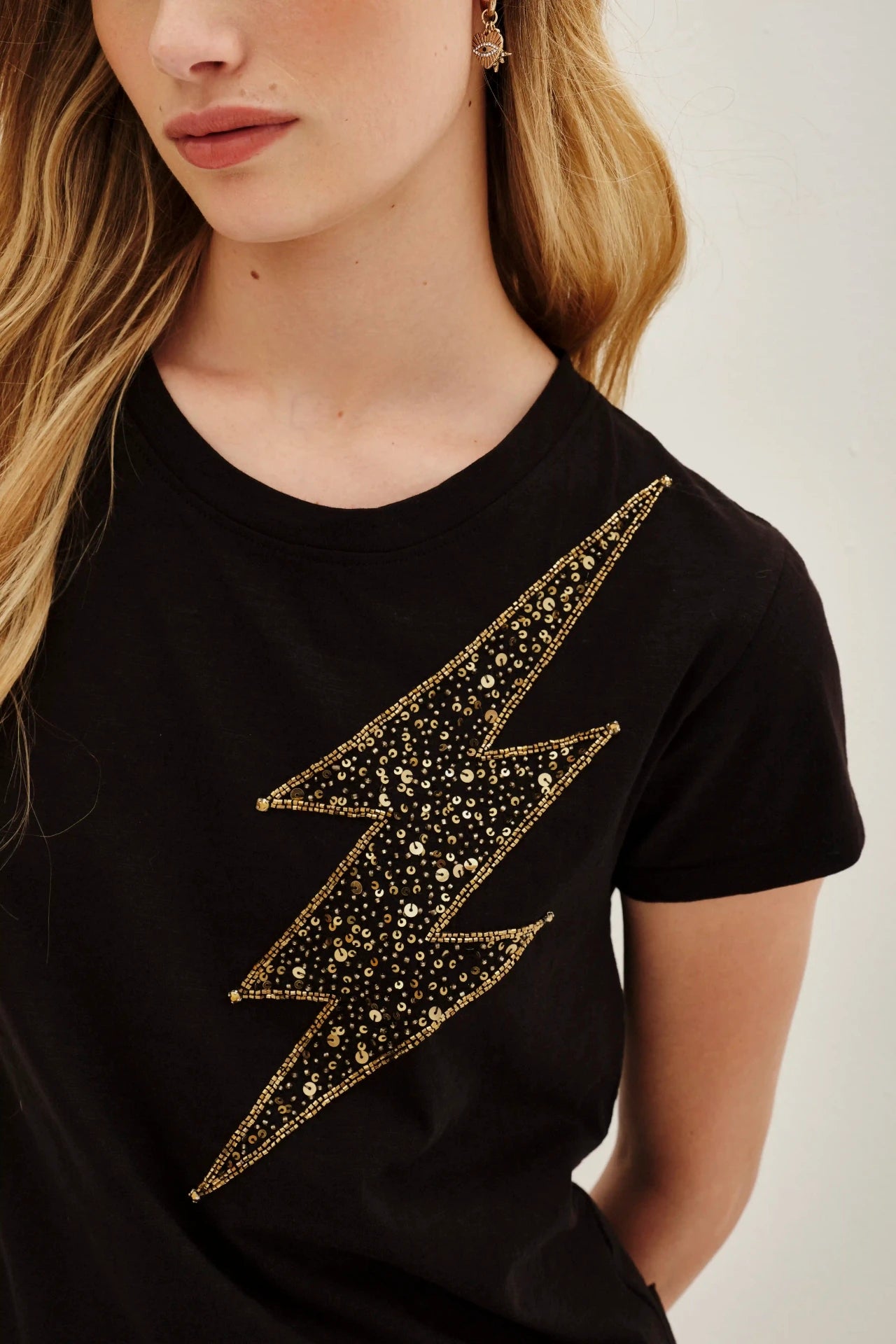 REMERA RAY GLOW